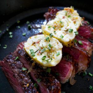 Leek and bacon compound butter on steak