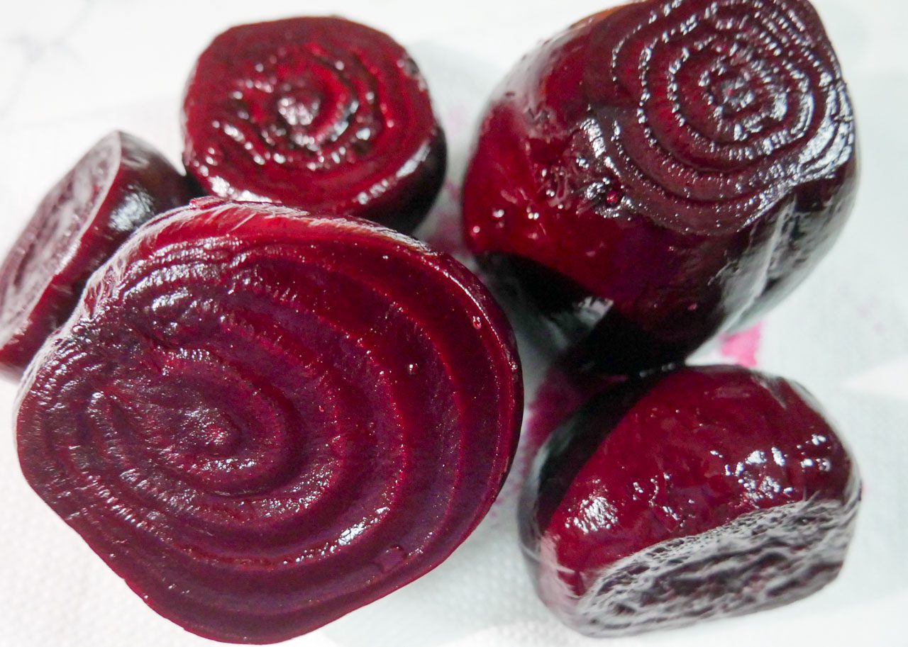 Roasted beets with skin off.