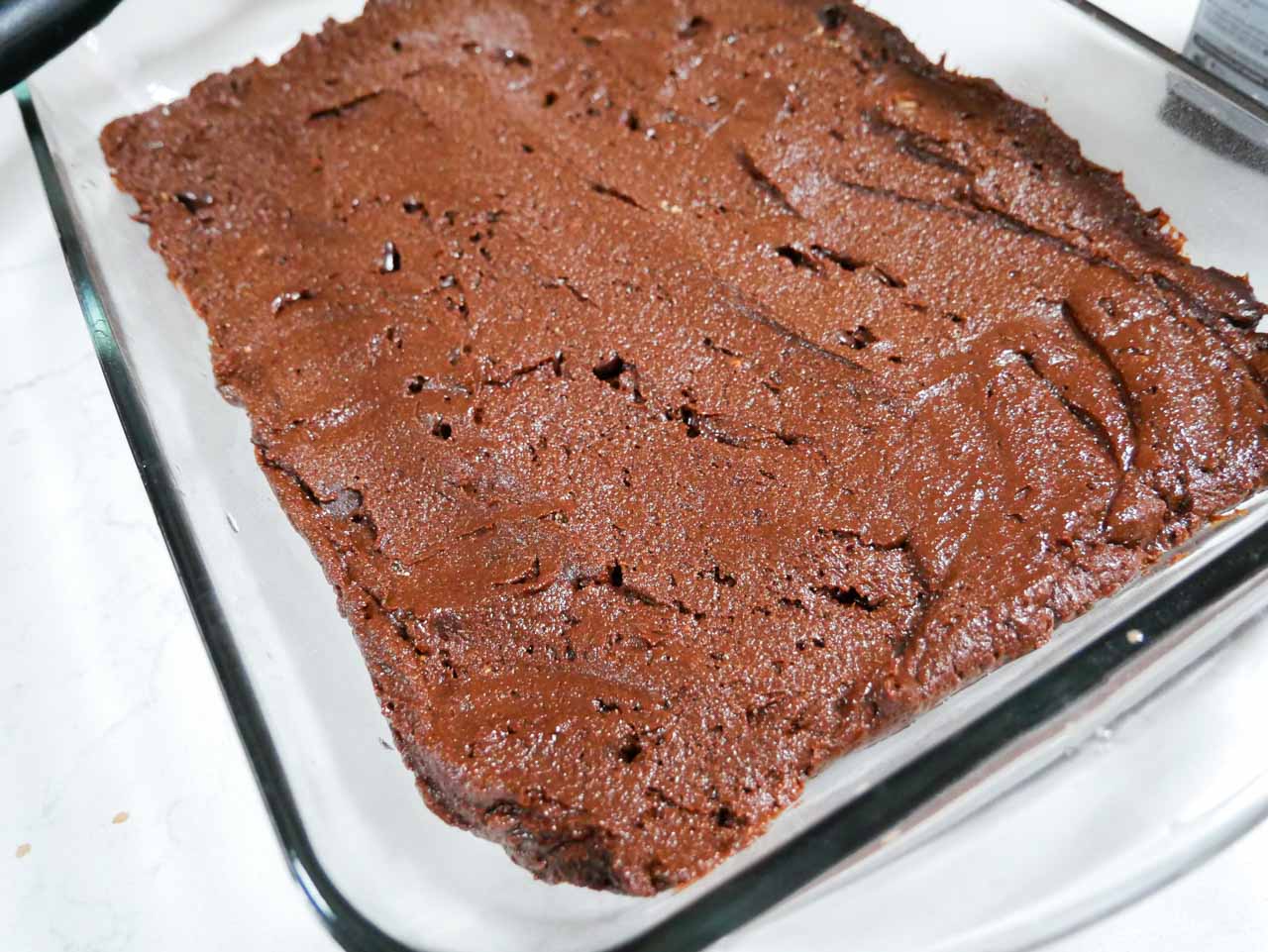 Brownie batter in pan