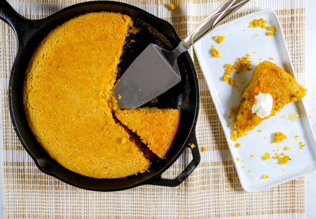 Allergy-friendly cornbread in a pan and sliced