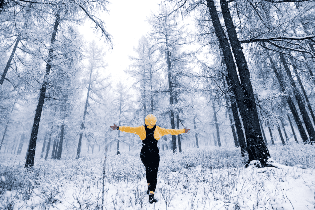 Person playing in the snow