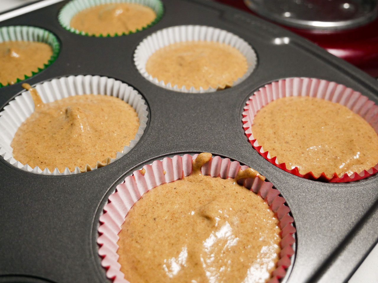 Gingerbread batter in cupcake molds