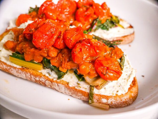 Savory Breakfast Lentil Open-faced Sandwich on a white plate