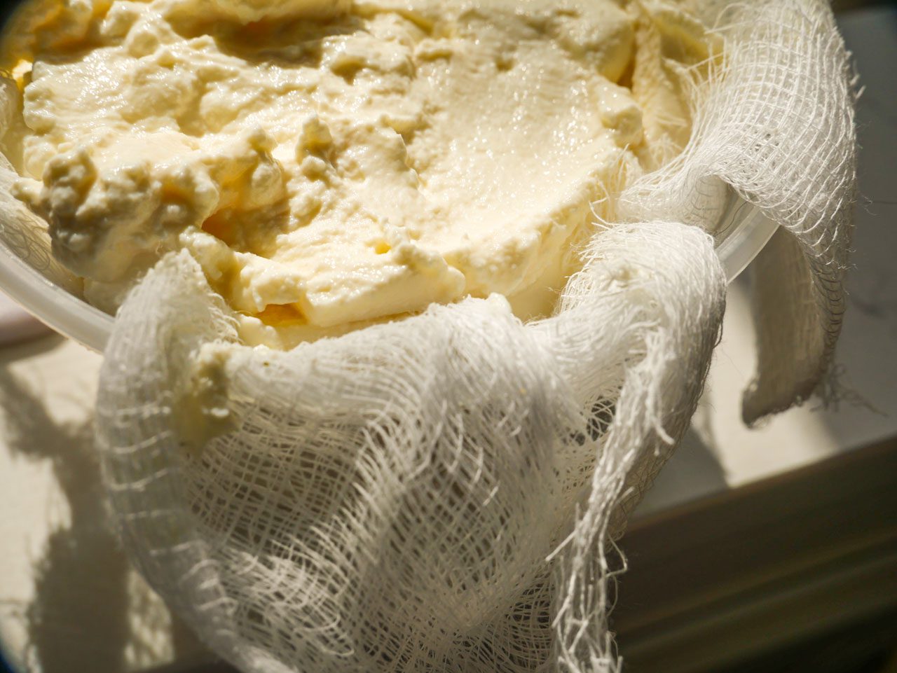 Ricotta in a cheesecloth